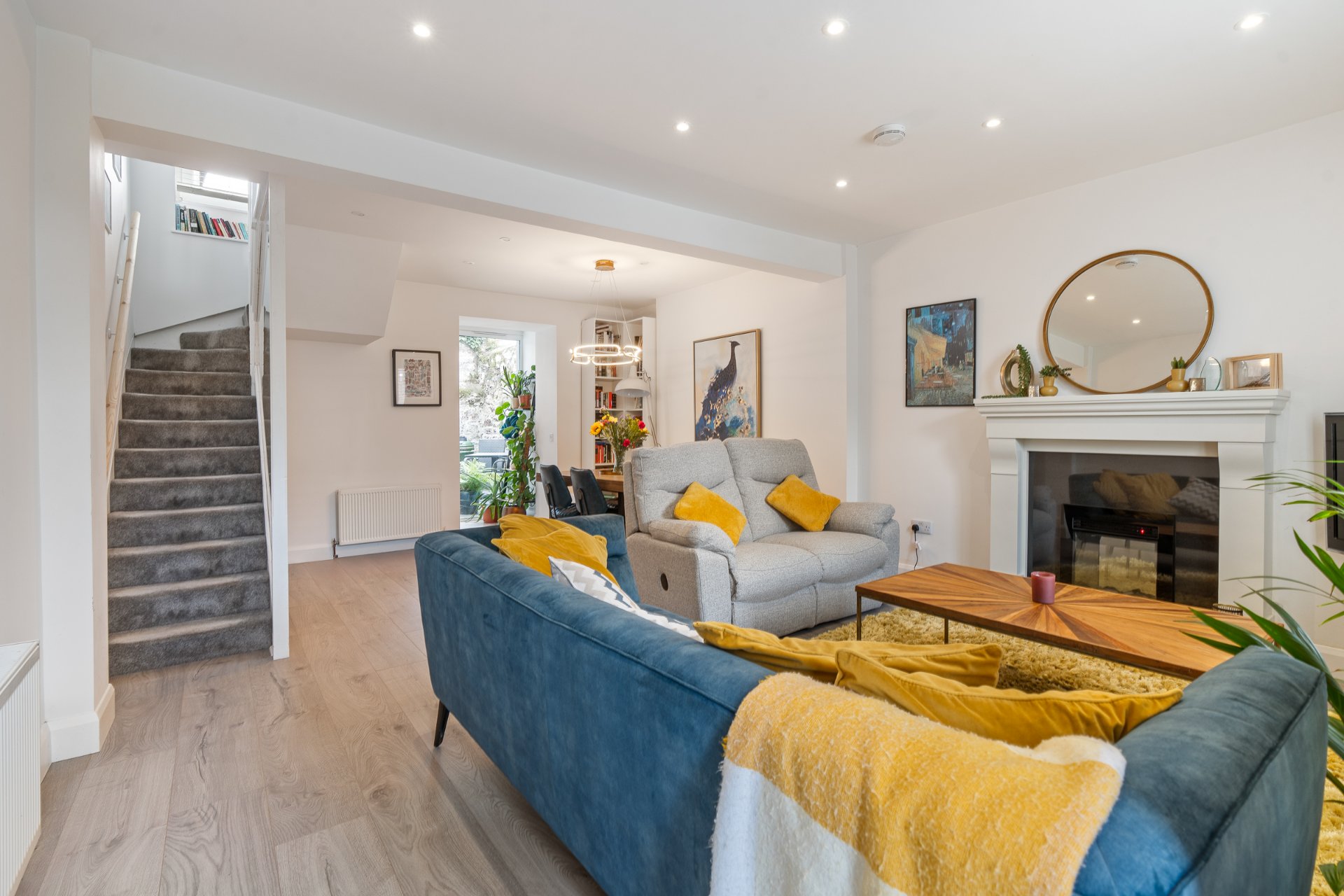 The bright open-plan living and dining room of a renovated Cork terraced home at Alexandra Villas